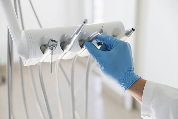 Professional Tooth Extraction technician working in Parke County County, IN